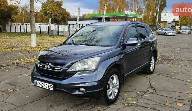 Серый Хонда СРВ, объемом двигателя 2 л и пробегом 135 тыс. км за 11300 $, фото 1 на Automoto.ua