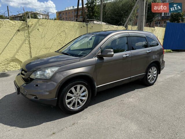 Серый Хонда СРВ, объемом двигателя 2.4 л и пробегом 160 тыс. км за 11000 $, фото 1 на Automoto.ua