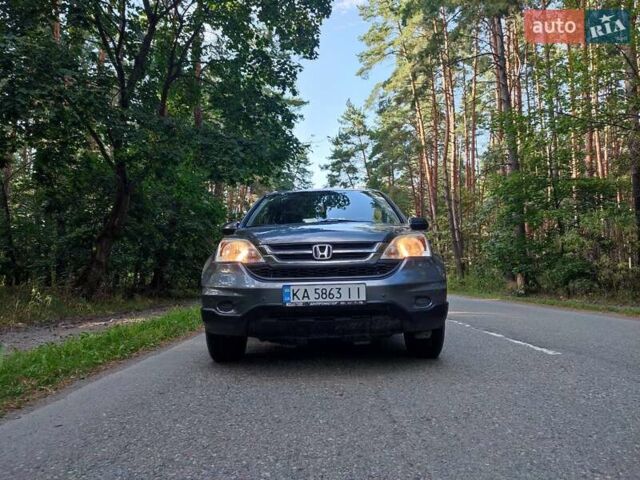 Серый Хонда СРВ, объемом двигателя 2.36 л и пробегом 190 тыс. км за 12000 $, фото 1 на Automoto.ua
