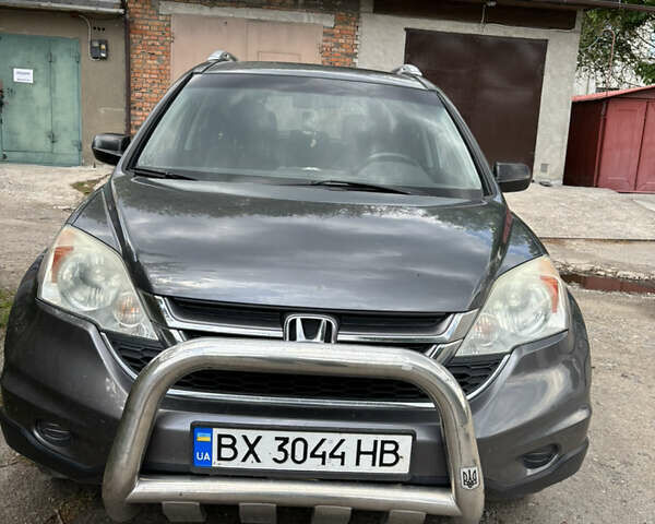 Серый Хонда СРВ, объемом двигателя 2.35 л и пробегом 190 тыс. км за 12300 $, фото 1 на Automoto.ua