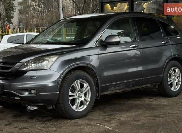 Серый Хонда СРВ, объемом двигателя 2.2 л и пробегом 228 тыс. км за 12700 $, фото 1 на Automoto.ua