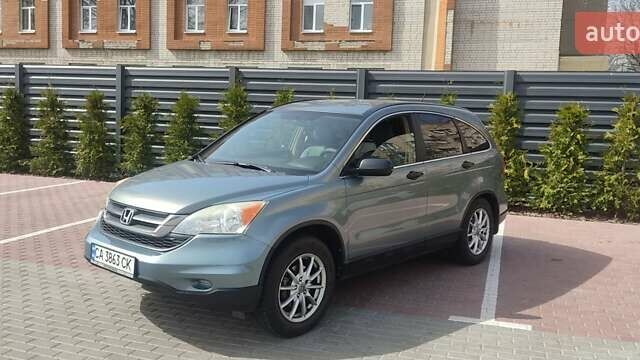 Серый Хонда СРВ, объемом двигателя 2.4 л и пробегом 243 тыс. км за 11380 $, фото 1 на Automoto.ua