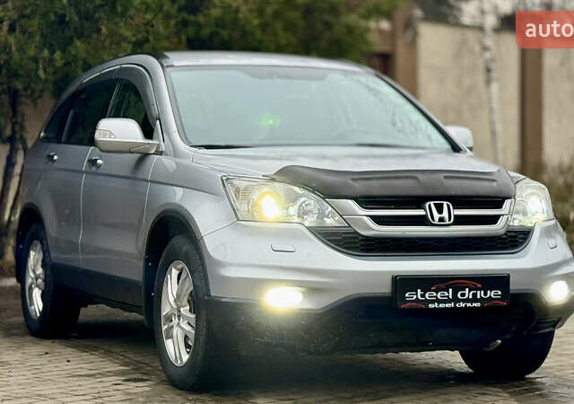 Серый Хонда СРВ, объемом двигателя 2 л и пробегом 175 тыс. км за 12299 $, фото 1 на Automoto.ua