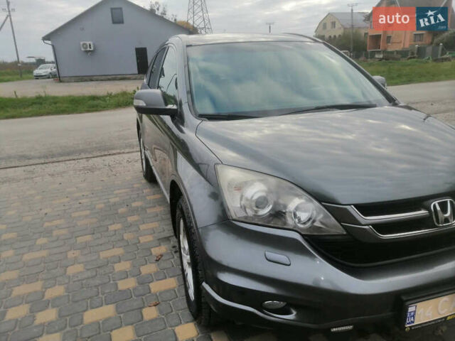 Сірий Хонда СРВ, об'ємом двигуна 2.2 л та пробігом 233 тис. км за 12750 $, фото 1 на Automoto.ua