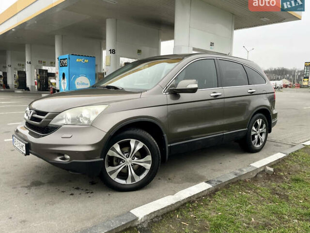 Серый Хонда СРВ, объемом двигателя 2.35 л и пробегом 179 тыс. км за 13600 $, фото 1 на Automoto.ua