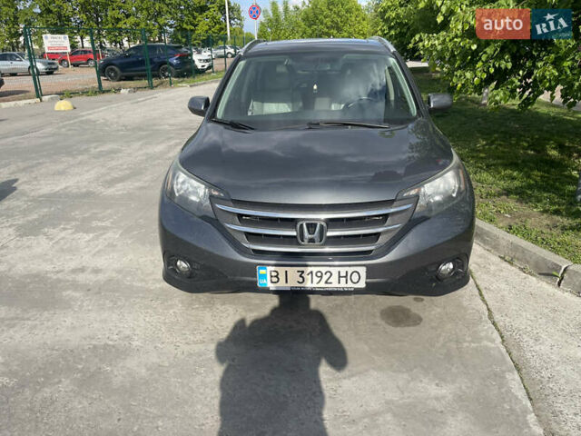 Серый Хонда СРВ, объемом двигателя 2.35 л и пробегом 150 тыс. км за 15000 $, фото 1 на Automoto.ua