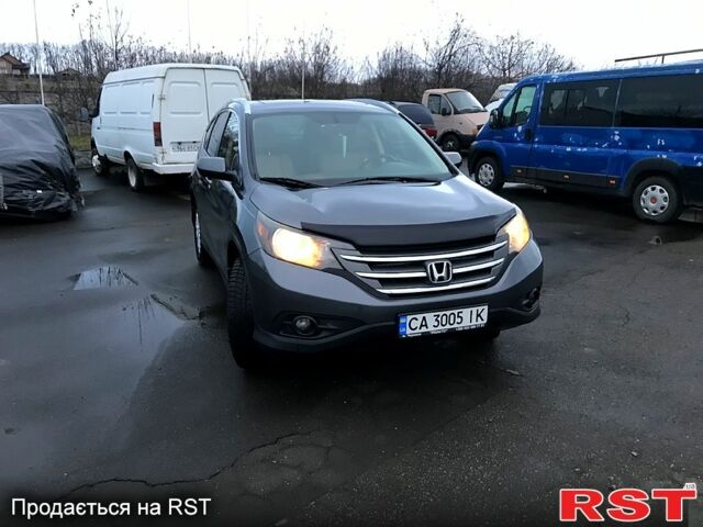 Серый Хонда СРВ, объемом двигателя 2.4 л и пробегом 135 тыс. км за 14000 $, фото 1 на Automoto.ua