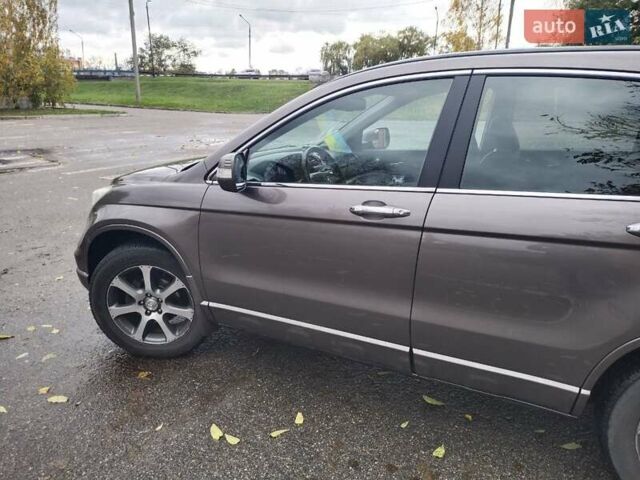 Серый Хонда СРВ, объемом двигателя 2.35 л и пробегом 250 тыс. км за 14000 $, фото 1 на Automoto.ua