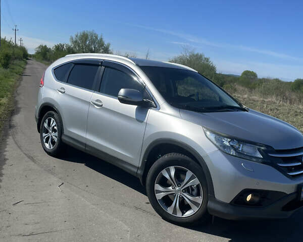 Серый Хонда СРВ, объемом двигателя 2.2 л и пробегом 283 тыс. км за 16500 $, фото 1 на Automoto.ua