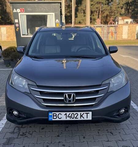 Серый Хонда СРВ, объемом двигателя 2.35 л и пробегом 253 тыс. км за 14000 $, фото 1 на Automoto.ua