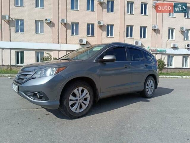 Серый Хонда СРВ, объемом двигателя 2.35 л и пробегом 220 тыс. км за 15500 $, фото 1 на Automoto.ua