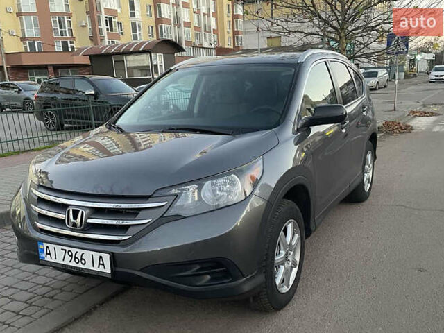 Серый Хонда СРВ, объемом двигателя 2.35 л и пробегом 162 тыс. км за 15300 $, фото 1 на Automoto.ua