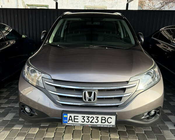 Серый Хонда СРВ, объемом двигателя 2.35 л и пробегом 128 тыс. км за 16500 $, фото 1 на Automoto.ua