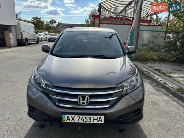 Серый Хонда СРВ, объемом двигателя 2.35 л и пробегом 205 тыс. км за 15300 $, фото 1 на Automoto.ua