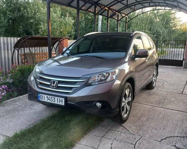 Серый Хонда СРВ, объемом двигателя 2.35 л и пробегом 181 тыс. км за 16500 $, фото 1 на Automoto.ua