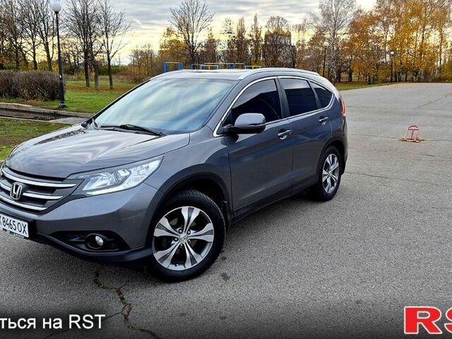 Серый Хонда СРВ, объемом двигателя 2.4 л и пробегом 170 тыс. км за 15500 $, фото 1 на Automoto.ua