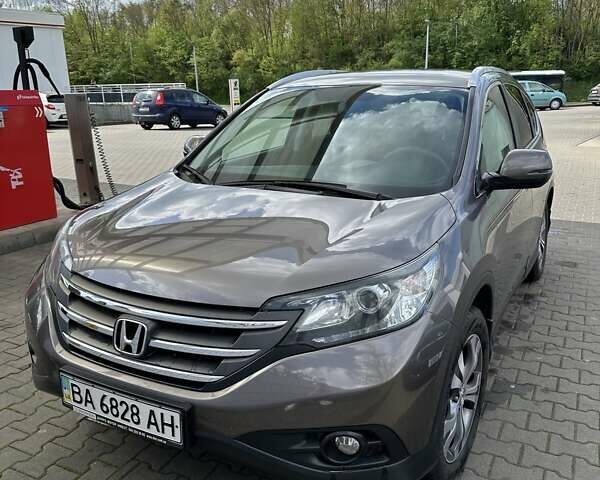 Серый Хонда СРВ, объемом двигателя 2.35 л и пробегом 143 тыс. км за 17400 $, фото 1 на Automoto.ua
