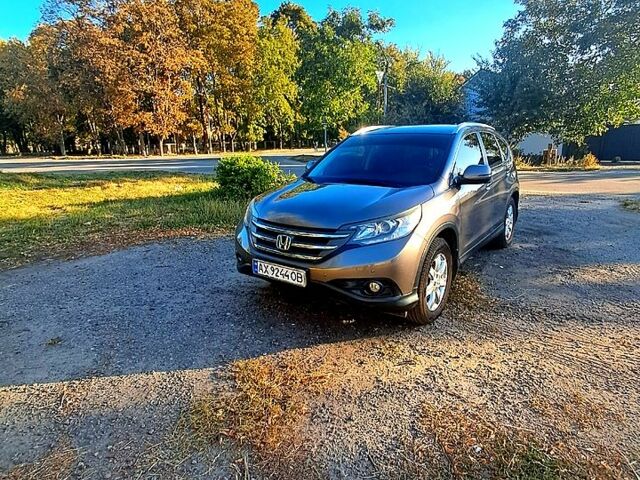 Серый Хонда СРВ, объемом двигателя 2.4 л и пробегом 162 тыс. км за 18000 $, фото 1 на Automoto.ua