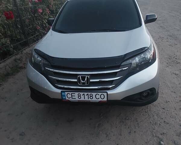 Серый Хонда СРВ, объемом двигателя 2.35 л и пробегом 256 тыс. км за 14900 $, фото 1 на Automoto.ua