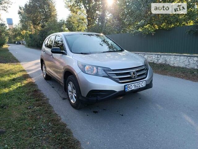 Серый Хонда СРВ, объемом двигателя 2.35 л и пробегом 116 тыс. км за 15000 $, фото 1 на Automoto.ua