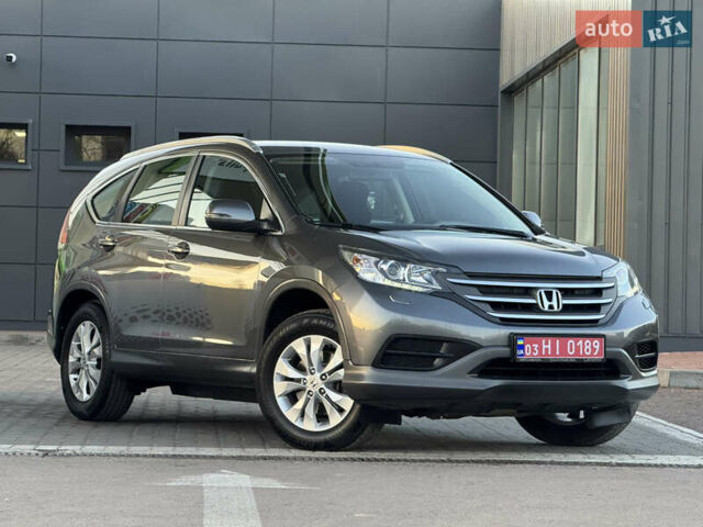 Серый Хонда СРВ, объемом двигателя 2.2 л и пробегом 228 тыс. км за 15899 $, фото 1 на Automoto.ua