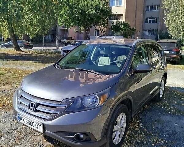 Серый Хонда СРВ, объемом двигателя 2.36 л и пробегом 148 тыс. км за 14400 $, фото 1 на Automoto.ua
