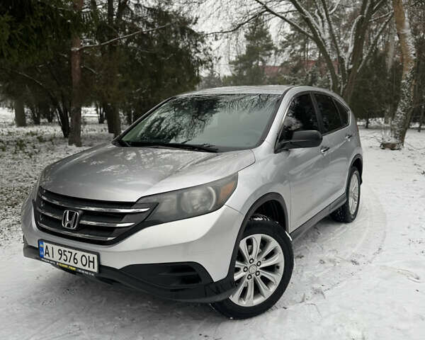 Сірий Хонда СРВ, об'ємом двигуна 2.35 л та пробігом 180 тис. км за 12999 $, фото 1 на Automoto.ua