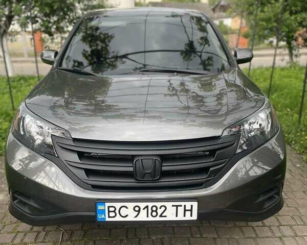 Серый Хонда СРВ, объемом двигателя 2.4 л и пробегом 158 тыс. км за 14699 $, фото 1 на Automoto.ua