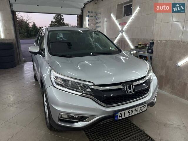 Серый Хонда СРВ, объемом двигателя 2.35 л и пробегом 235 тыс. км за 15750 $, фото 1 на Automoto.ua