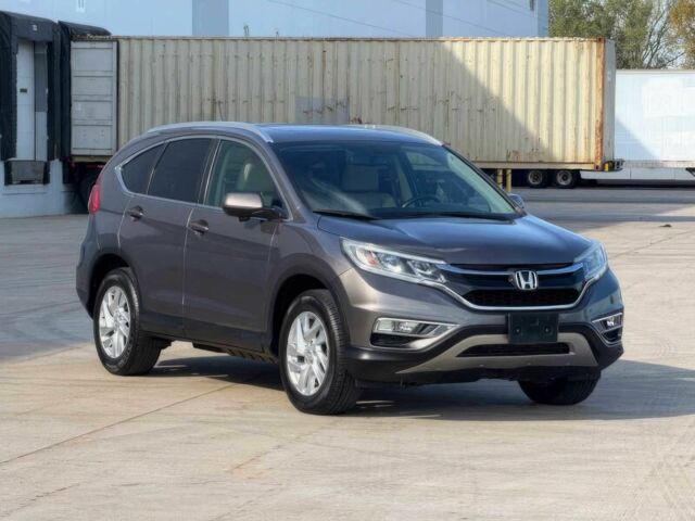 Серый Хонда СРВ, объемом двигателя 2.4 л и пробегом 76 тыс. км за 10100 $, фото 1 на Automoto.ua