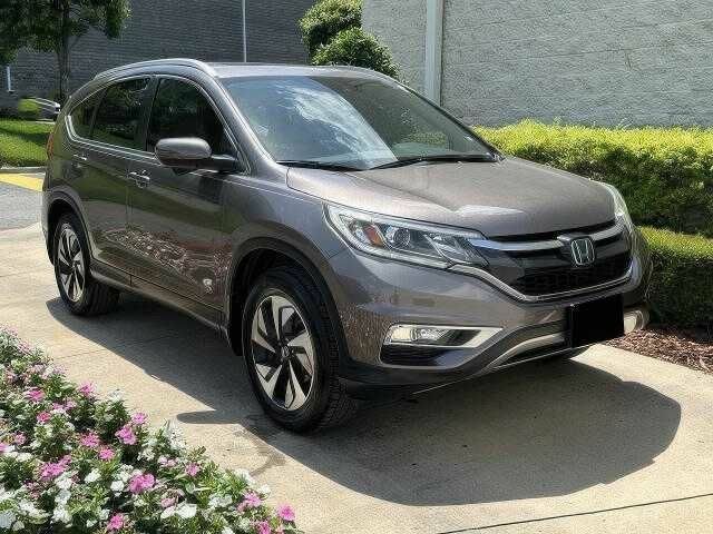 Серый Хонда СРВ, объемом двигателя 2.4 л и пробегом 134 тыс. км за 7600 $, фото 1 на Automoto.ua