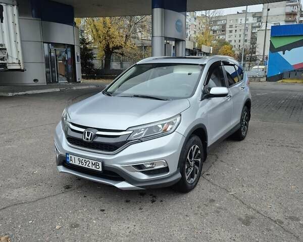 Серый Хонда СРВ, объемом двигателя 2.36 л и пробегом 135 тыс. км за 16999 $, фото 1 на Automoto.ua