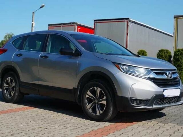 Серый Хонда СРВ, объемом двигателя 2 л и пробегом 119 тыс. км за 19200 $, фото 1 на Automoto.ua