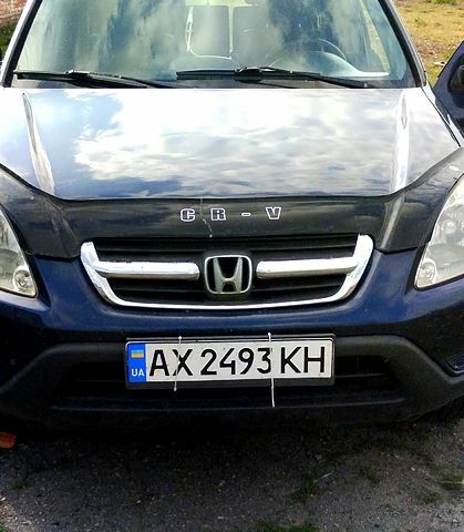 Синий Хонда СРВ, объемом двигателя 2 л и пробегом 220 тыс. км за 5950 $, фото 1 на Automoto.ua
