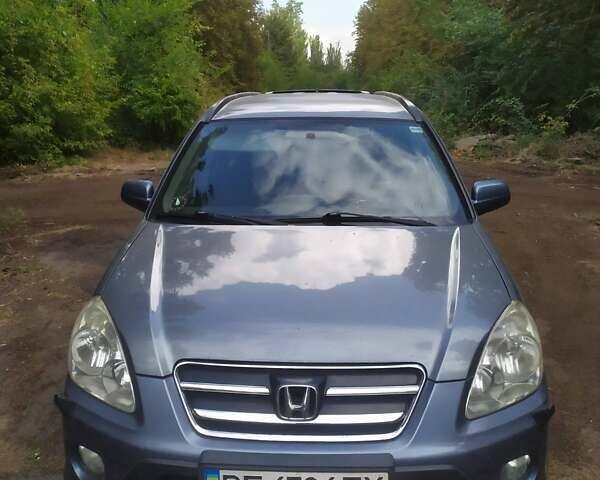 Синий Хонда СРВ, объемом двигателя 2 л и пробегом 244 тыс. км за 5000 $, фото 1 на Automoto.ua