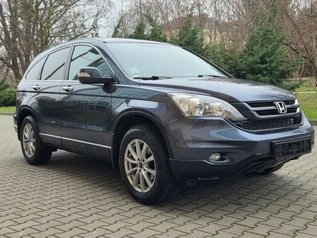 Синий Хонда СРВ, объемом двигателя 2 л и пробегом 165 тыс. км за 7600 $, фото 1 на Automoto.ua