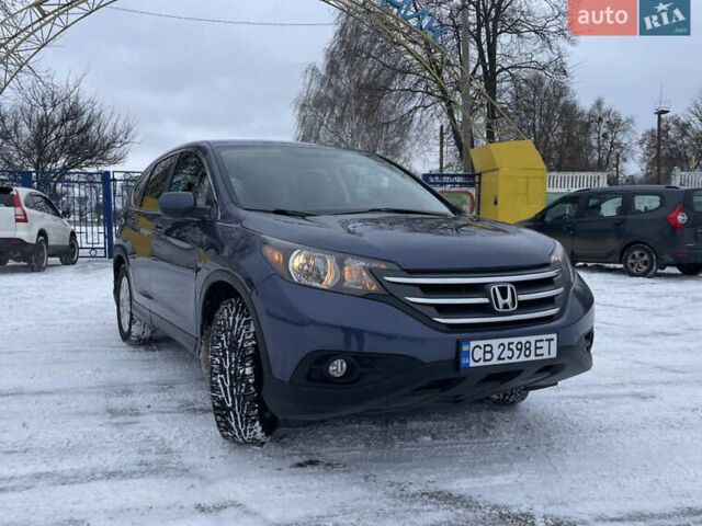 Синий Хонда СРВ, объемом двигателя 2.36 л и пробегом 203 тыс. км за 13300 $, фото 1 на Automoto.ua