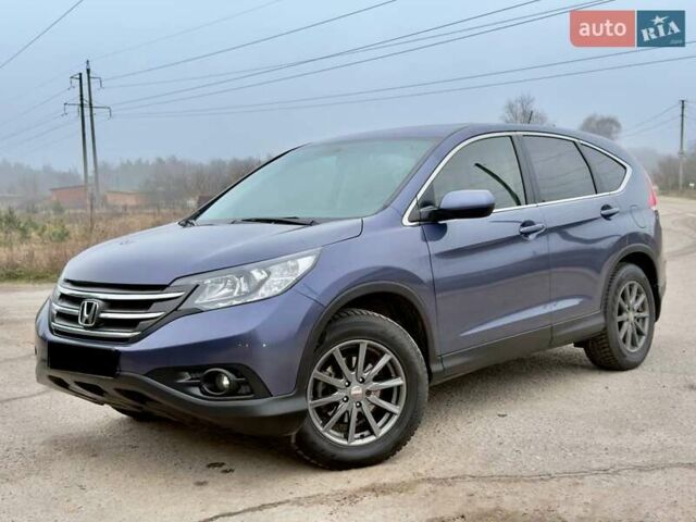 Синий Хонда СРВ, объемом двигателя 2.4 л и пробегом 158 тыс. км за 12999 $, фото 1 на Automoto.ua