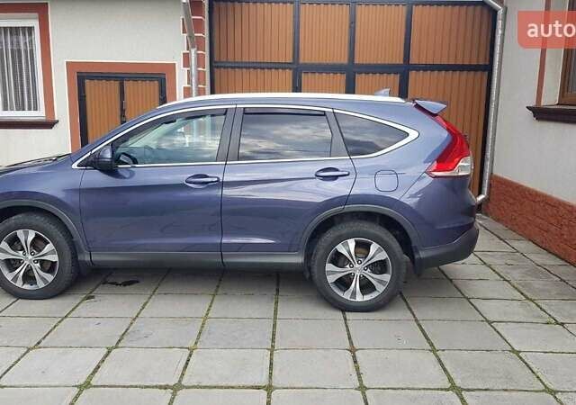 Синий Хонда СРВ, объемом двигателя 2.2 л и пробегом 320 тыс. км за 18313 $, фото 1 на Automoto.ua