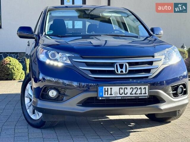 Синий Хонда СРВ, объемом двигателя 1.6 л и пробегом 215 тыс. км за 14400 $, фото 1 на Automoto.ua