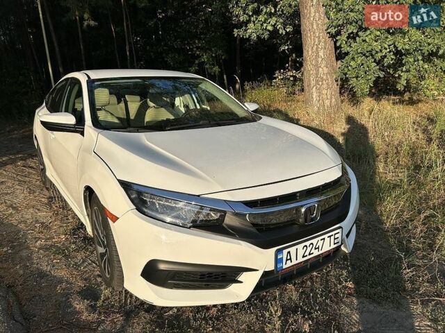 Белый Хонда Цивик, объемом двигателя 2 л и пробегом 108 тыс. км за 13545 $, фото 1 на Automoto.ua