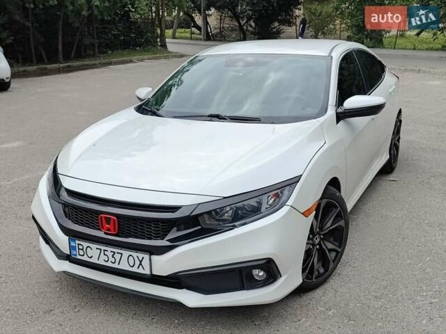Белый Хонда Цивик, объемом двигателя 2 л и пробегом 174 тыс. км за 14000 $, фото 1 на Automoto.ua