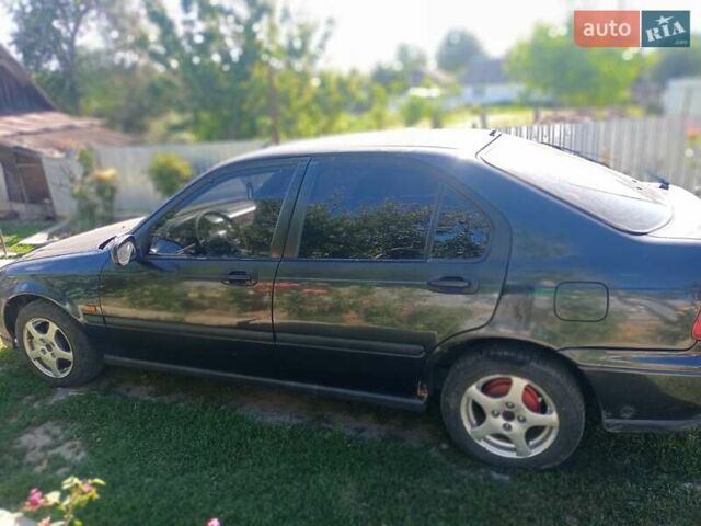 Черный Хонда Цивик, объемом двигателя 1.4 л и пробегом 338 тыс. км за 1700 $, фото 1 на Automoto.ua