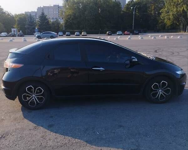 Черный Хонда Цивик, объемом двигателя 1.8 л и пробегом 199 тыс. км за 6400 $, фото 1 на Automoto.ua