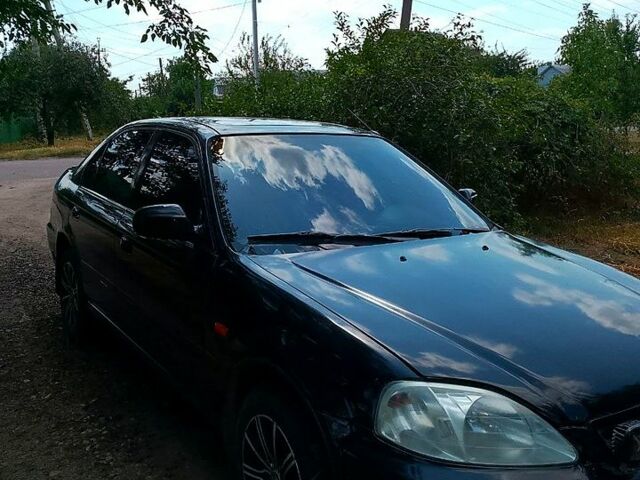 Хонда Цивик 1998 в Кропивницком (Кировограде) на Automoto.ua Черный Хонда Цивик, объемом двигателя 1.4 л и пробегом 250 тыс. км за 1900 $, фото 1 на Automoto.ua