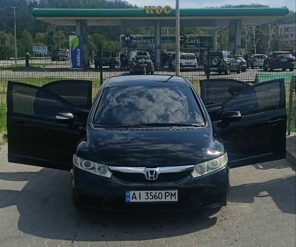 Черный Хонда Цивик, объемом двигателя 1.3 л и пробегом 216 тыс. км за 5400 $, фото 1 на Automoto.ua