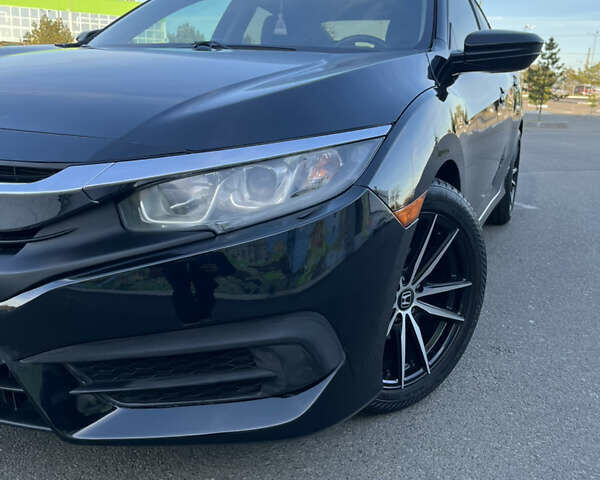 Черный Хонда Цивик, объемом двигателя 2 л и пробегом 129 тыс. км за 12300 $, фото 1 на Automoto.ua