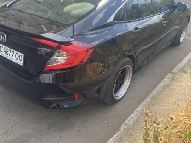 Чорний Хонда Сівік, об'ємом двигуна 2 л та пробігом 73 тис. км за 11111 $, фото 1 на Automoto.ua