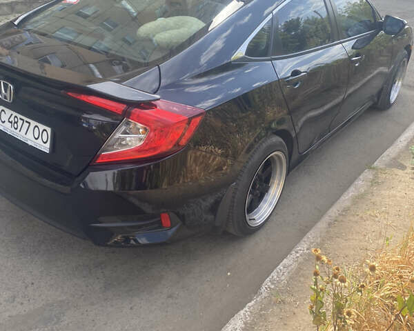 Черный Хонда Цивик, объемом двигателя 2 л и пробегом 73 тыс. км за 12500 $, фото 1 на Automoto.ua