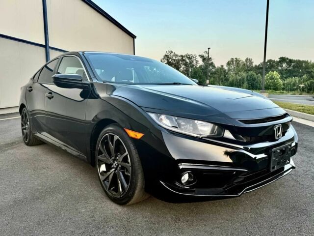 Черный Хонда Цивик, объемом двигателя 2 л и пробегом 15 тыс. км за 8000 $, фото 1 на Automoto.ua